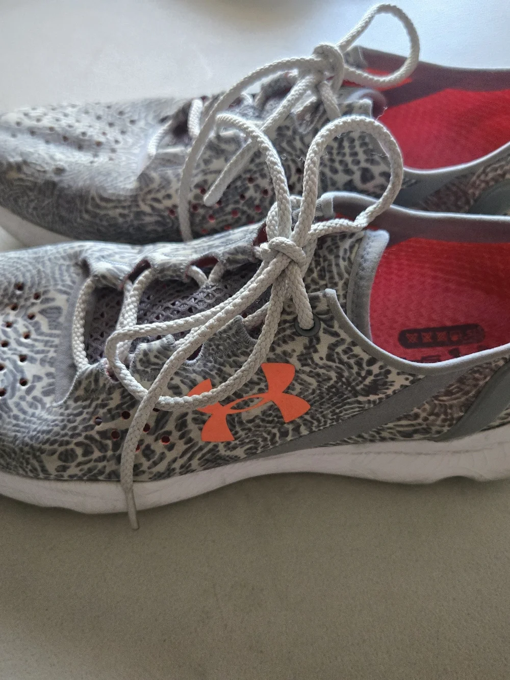 Under Armour Women's Gray Athletic Sneakers with Orange Logo Accent